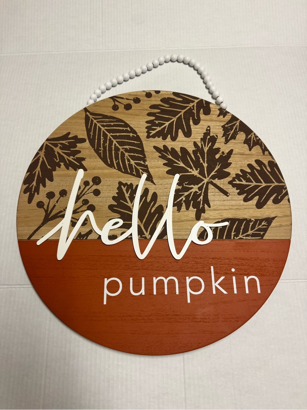 Hello Pumpkin Round Wall Sign in Rust and Wood Tones